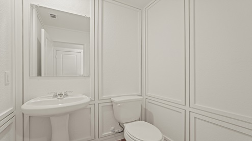 Powder bathroom with pedestal sink