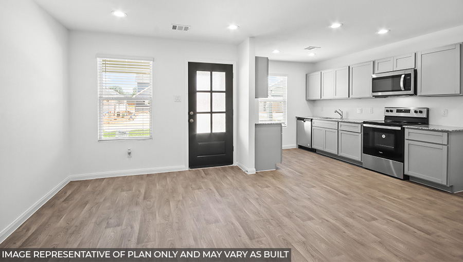Open concept living, dining, and kitchen area