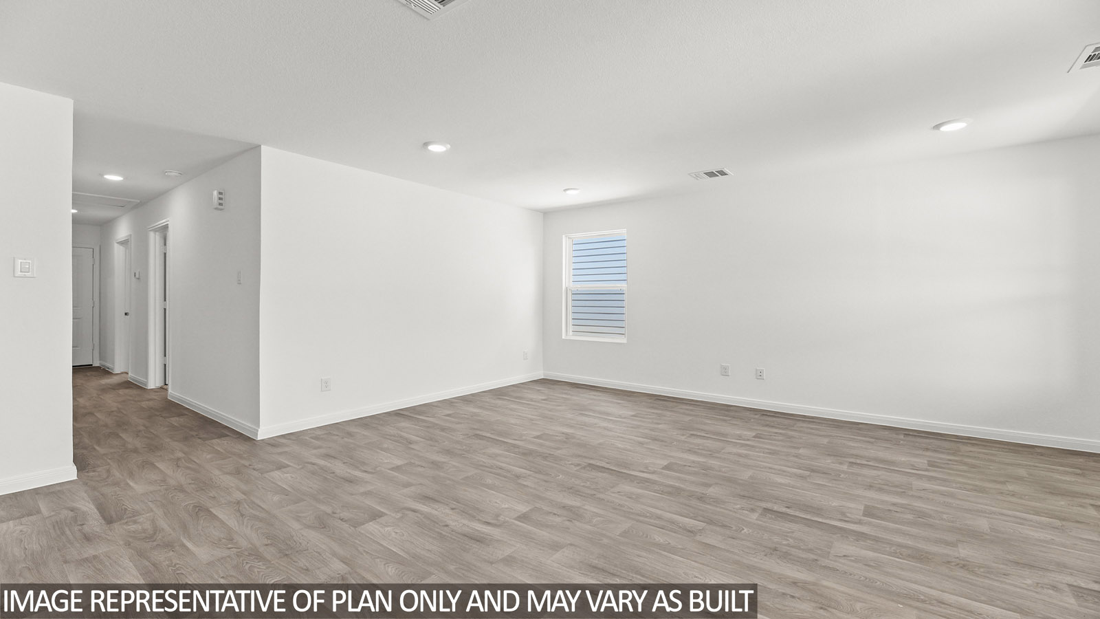 Open concept living, dining, and kitchen area