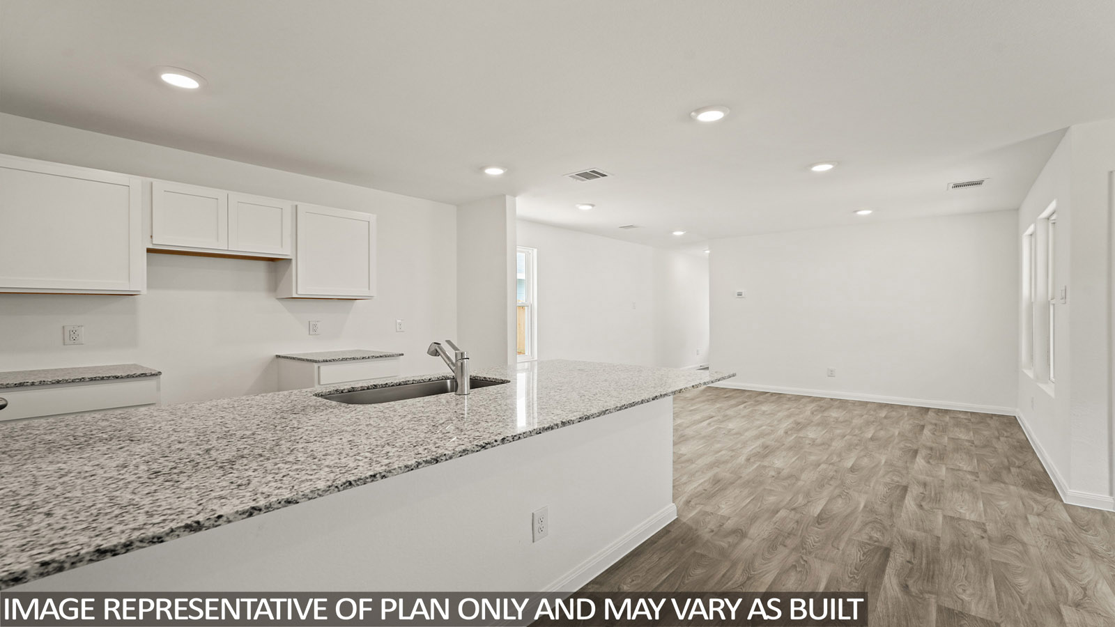 Open concept living, dining, and kitchen area