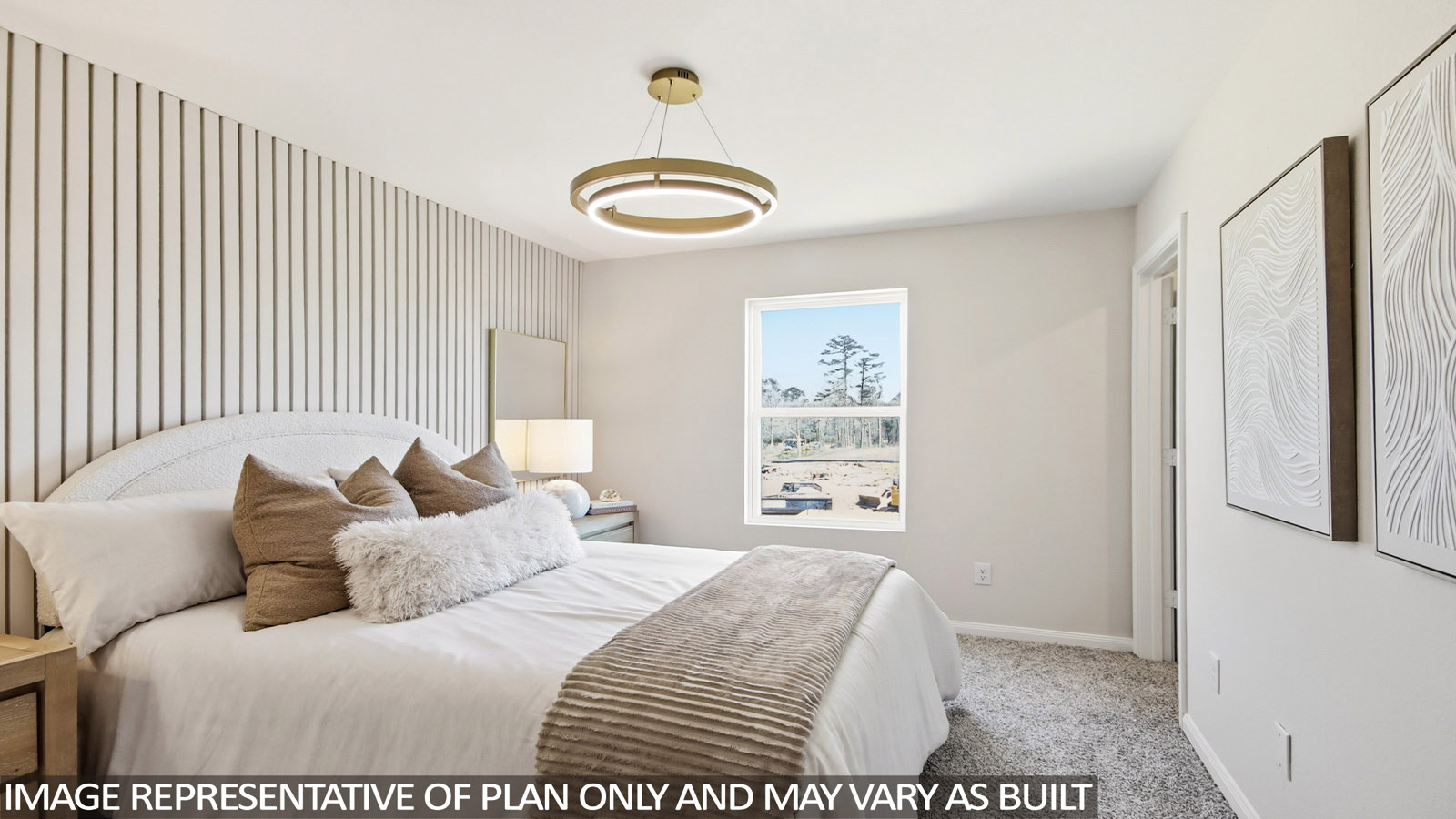 Primary bedroom with carpet flooring