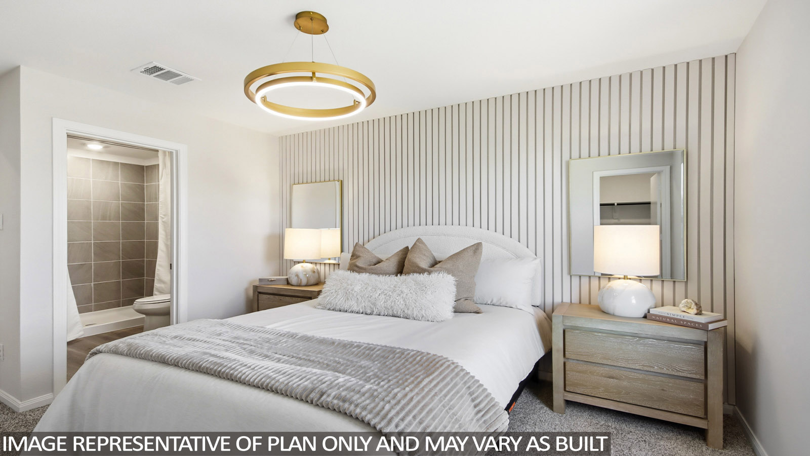 Primary bedroom with bright windows