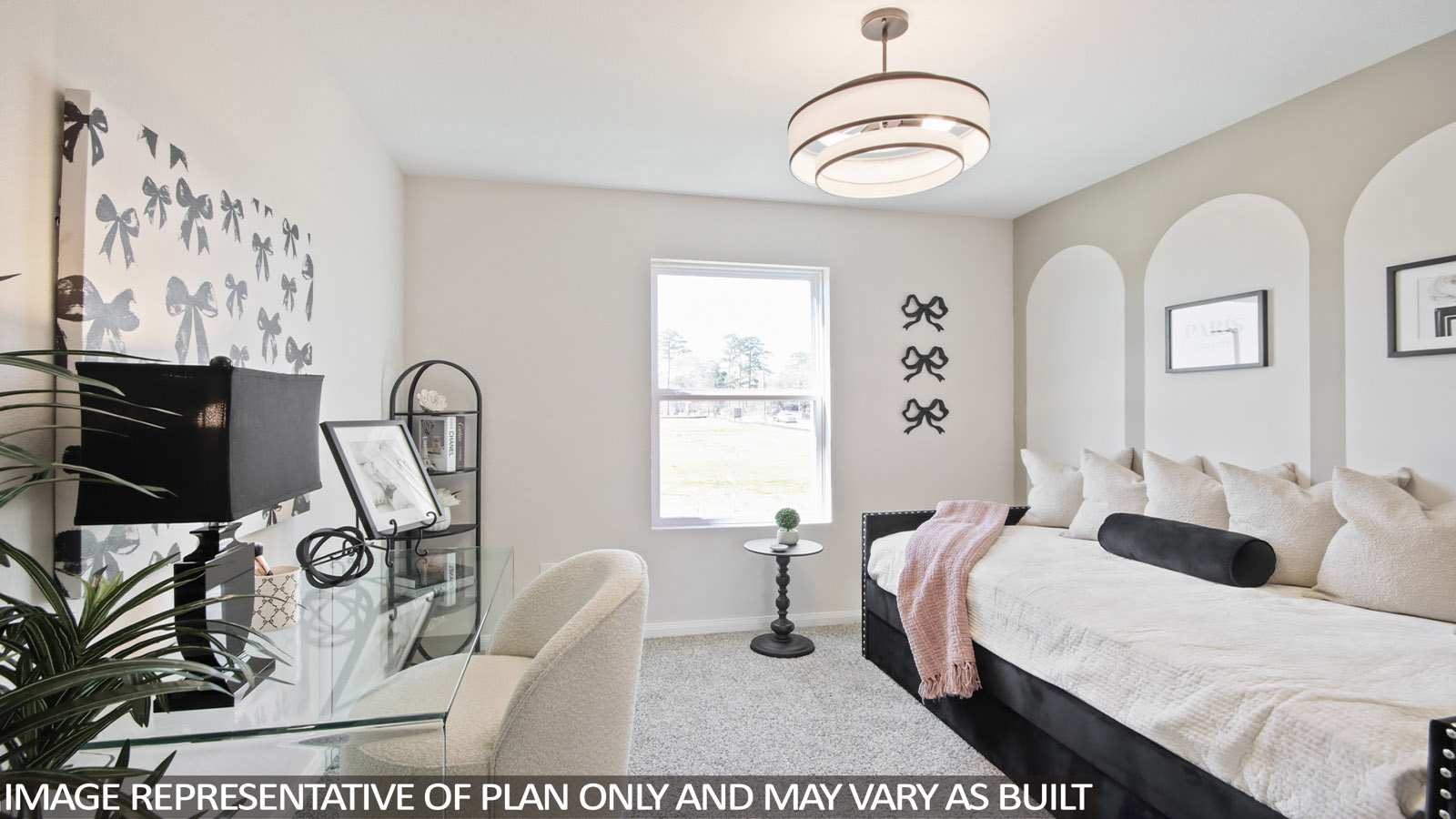 Secondary bedroom with carpet flooring
