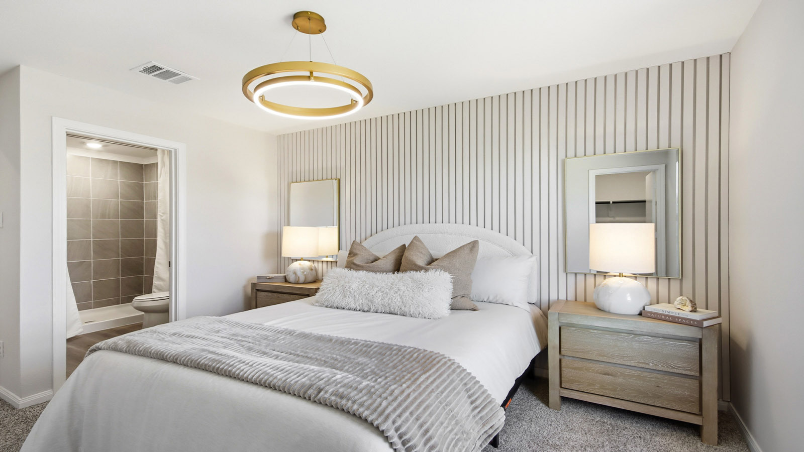Primary bedroom with carpet flooring