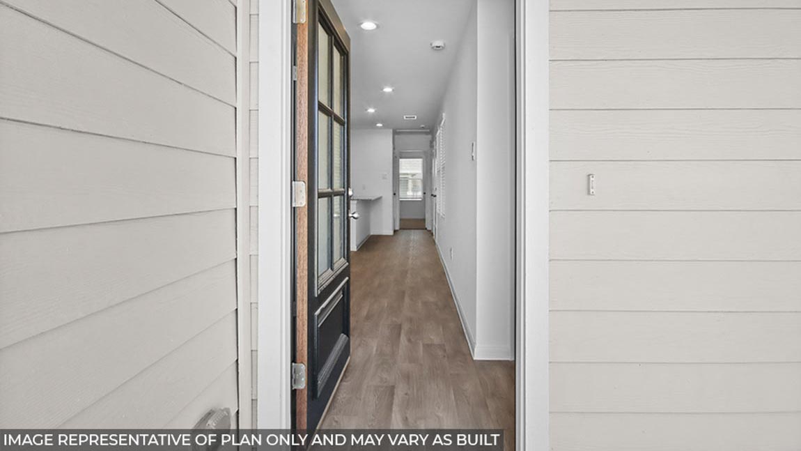 Entry hallway with vinyl flooring