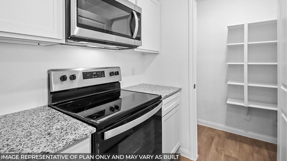 Open concept living, dining, and kitchen area