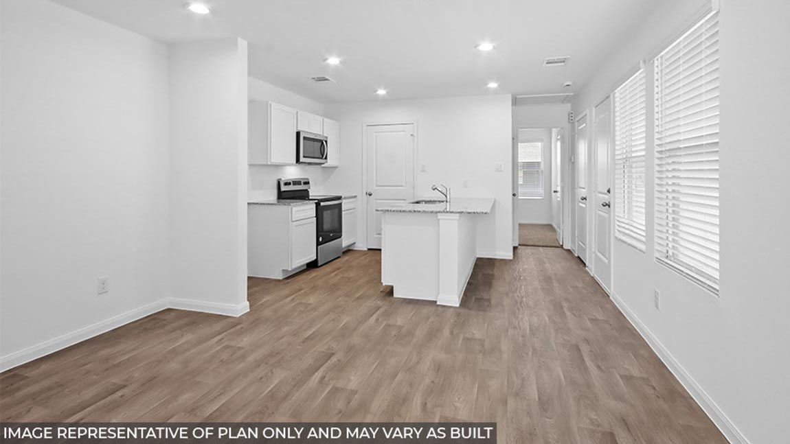 Open concept living, dining, and kitchen area
