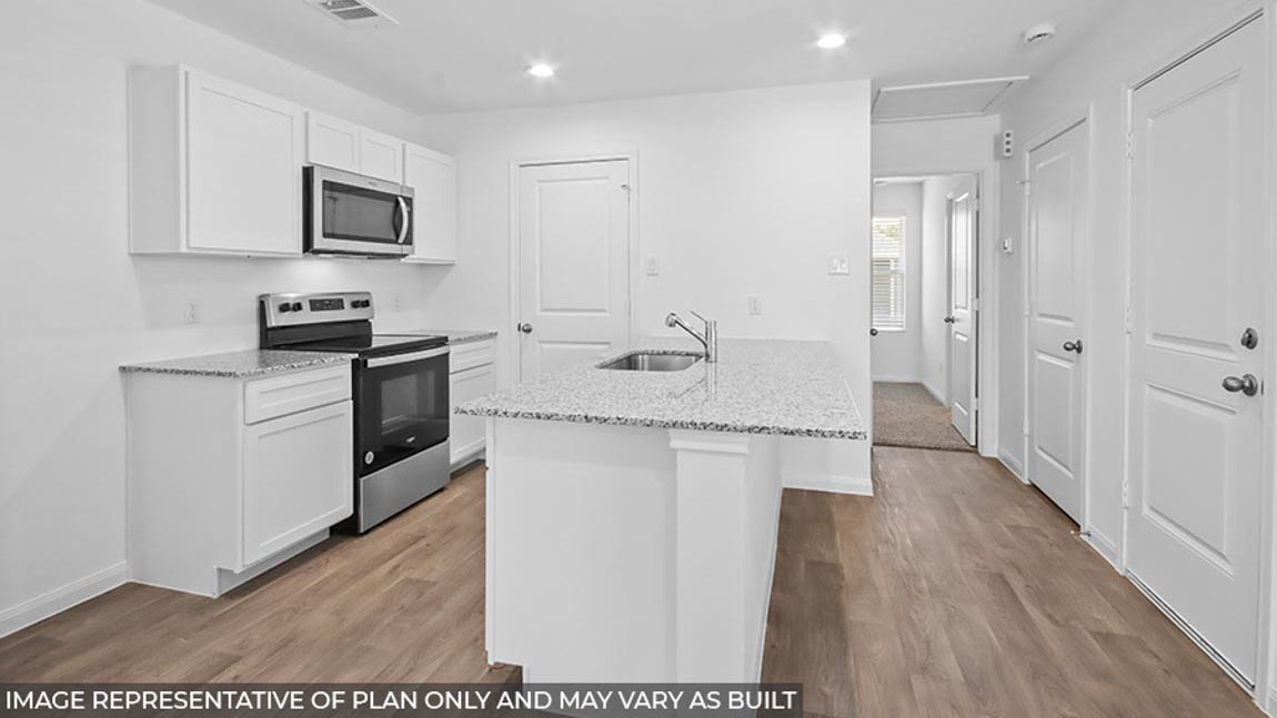 Open concept living, dining, and kitchen area