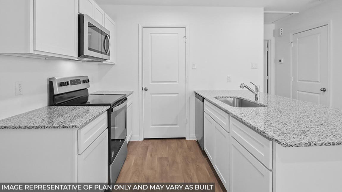 Open concept living, dining, and kitchen area