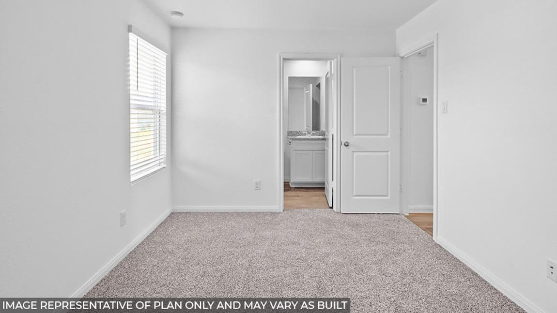 Secondary bedroom with bright window