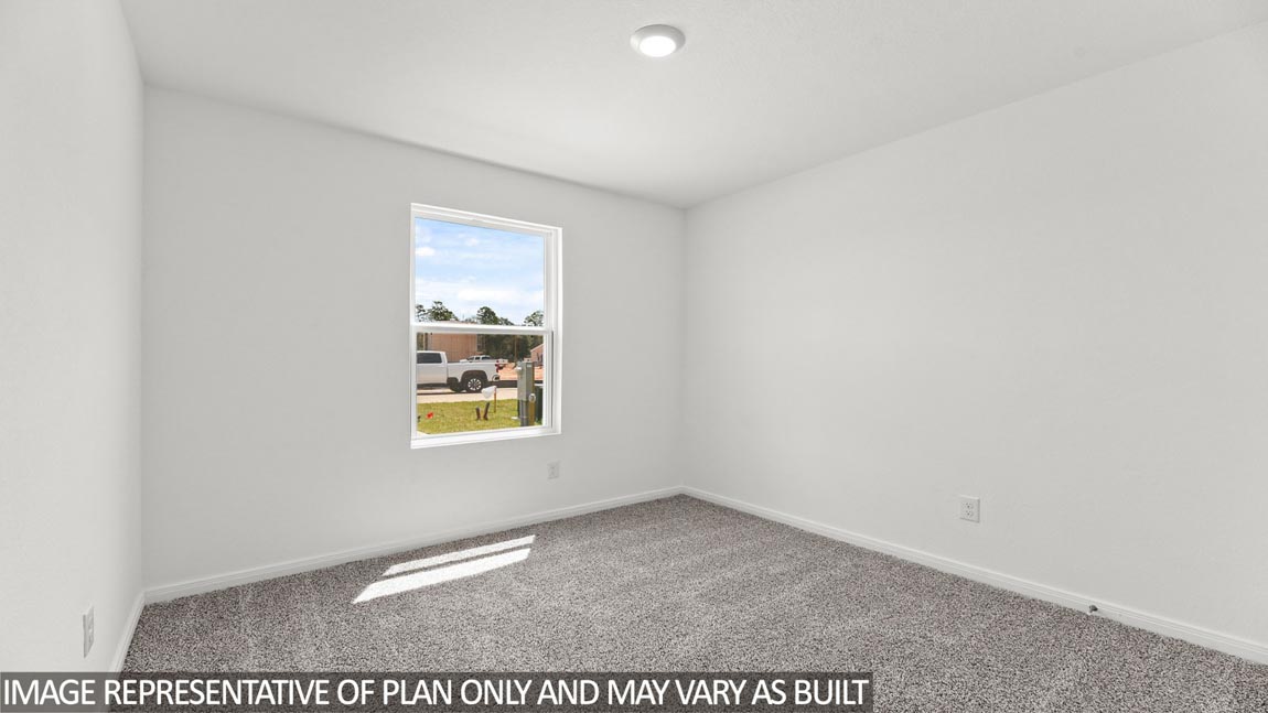 Secondary bedroom with bright window