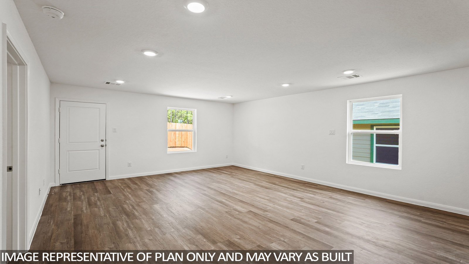 Open concept living, dining, and kitchen area