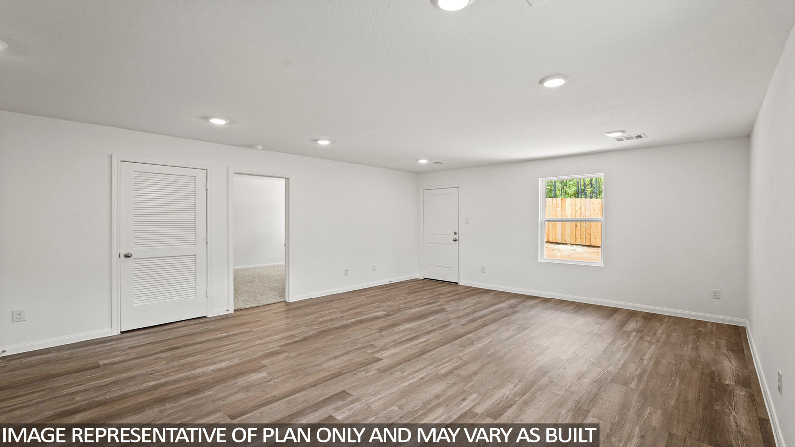 Open concept living, dining, and kitchen area