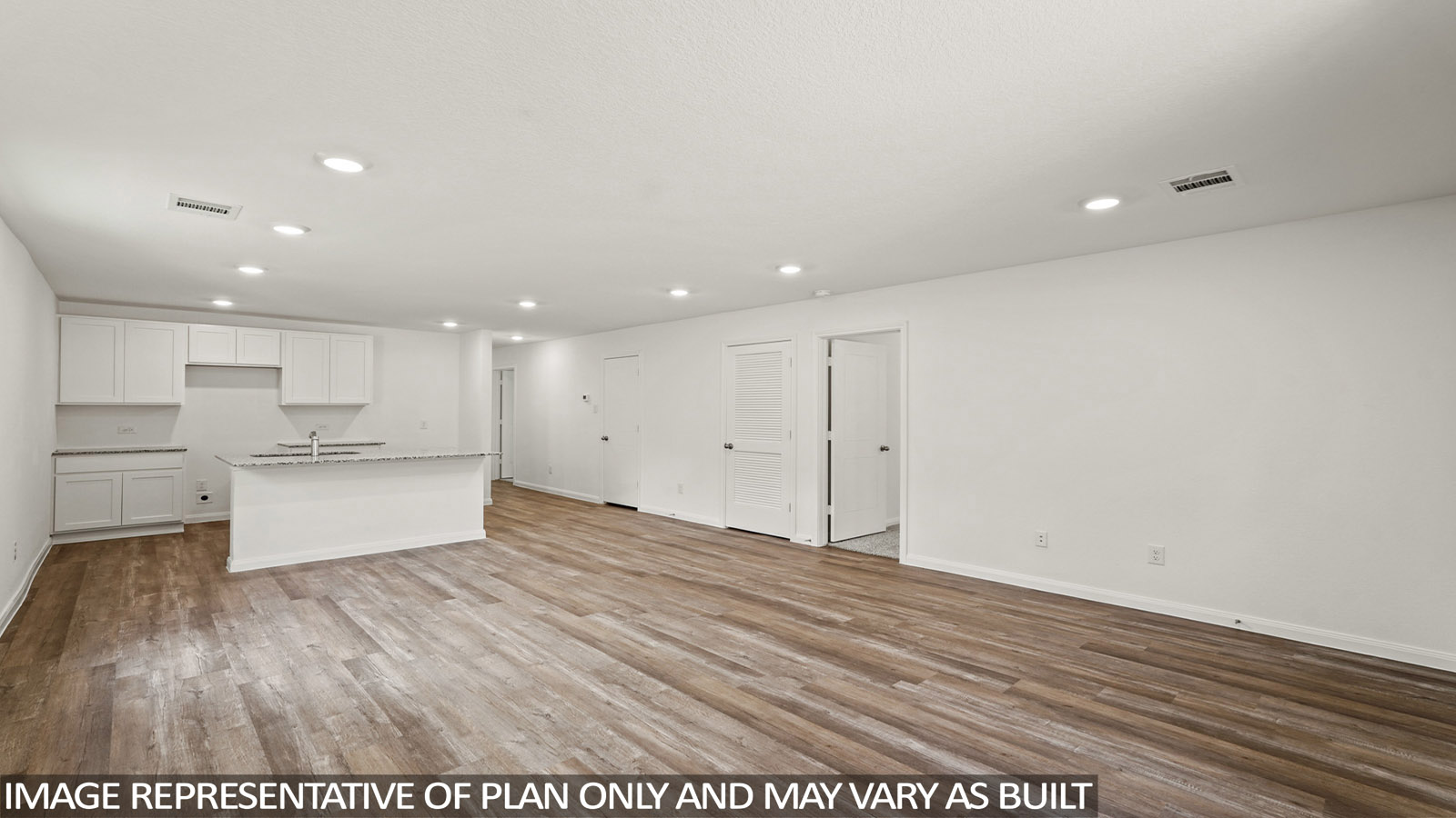 Open concept living, dining, and kitchen area