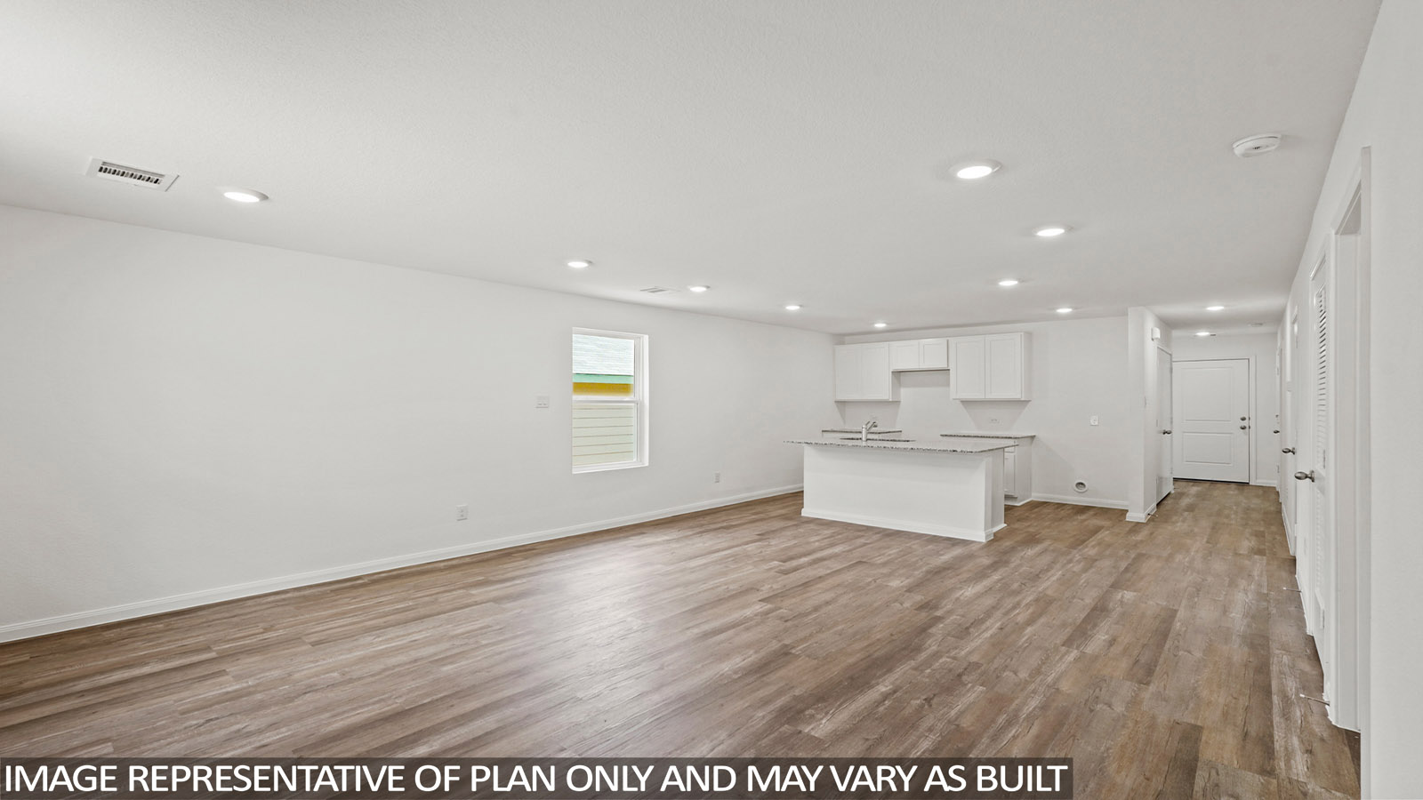 Open concept living, dining, and kitchen area