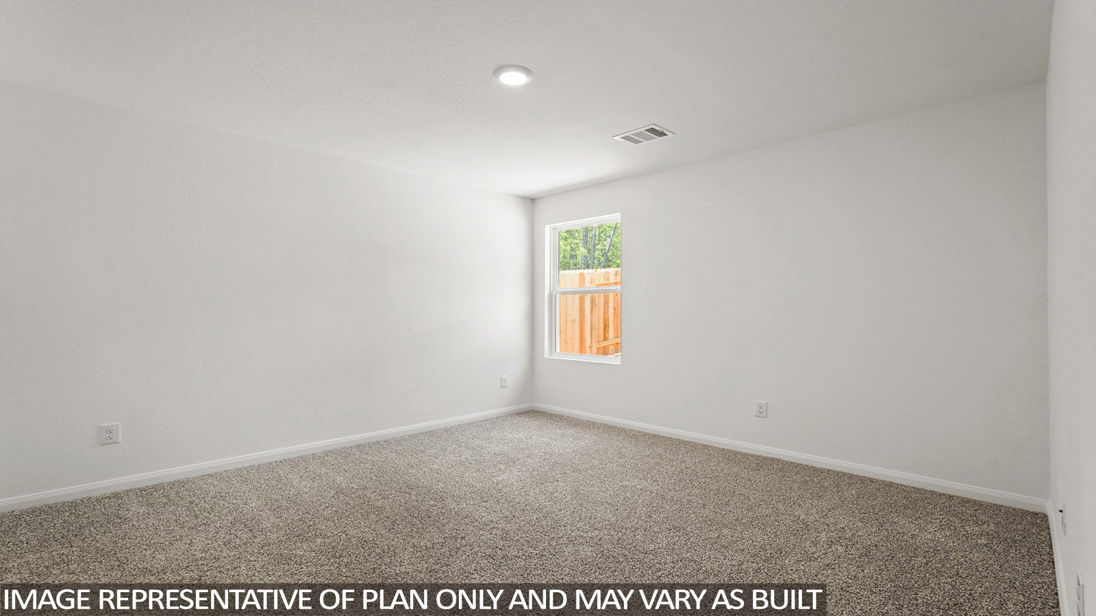 Primary bedroom with bright windows