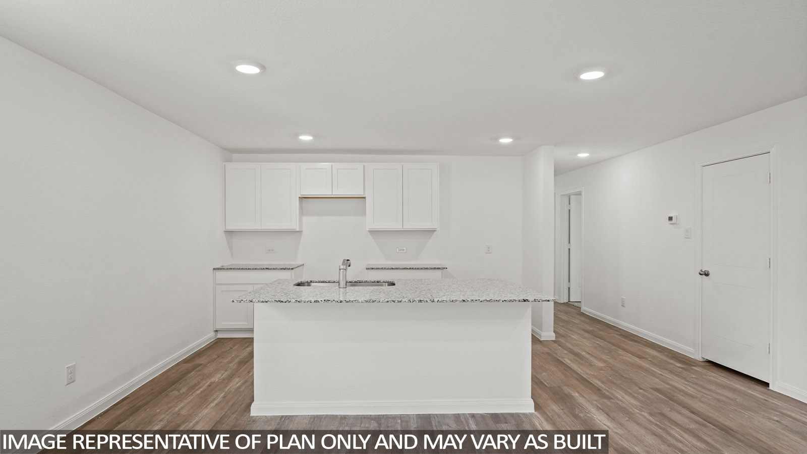 Open concept living, dining, and kitchen area