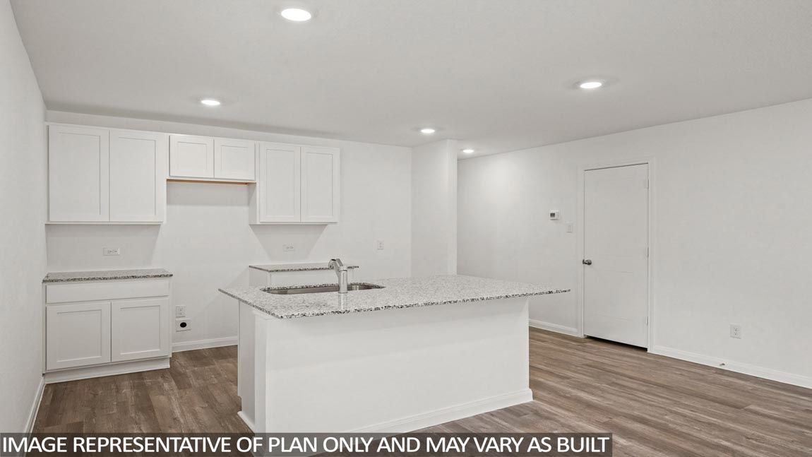 Open concept living, dining, and kitchen area