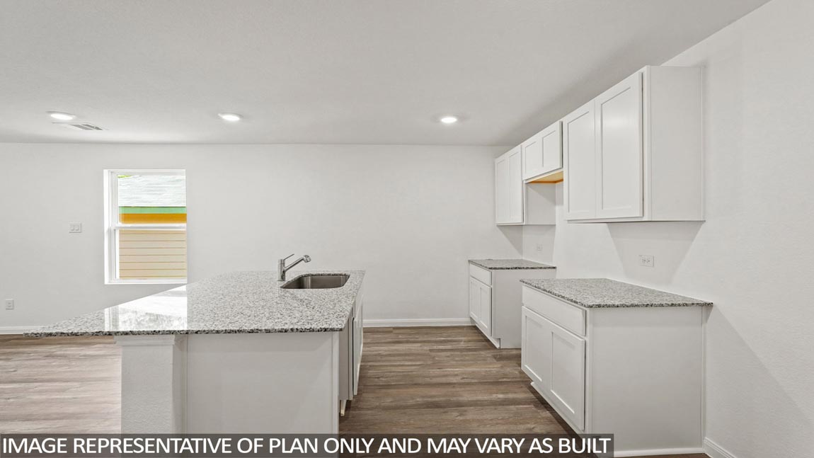 Open concept living, dining, and kitchen area