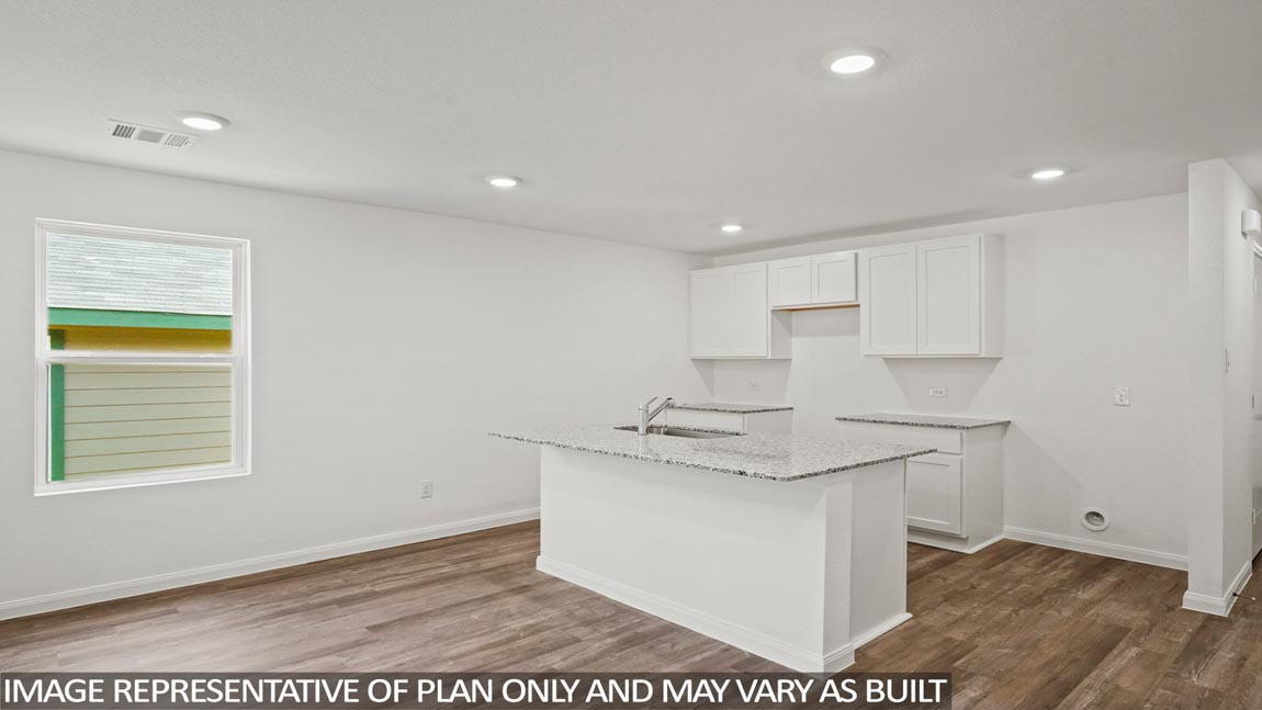 Open concept living, dining, and kitchen area