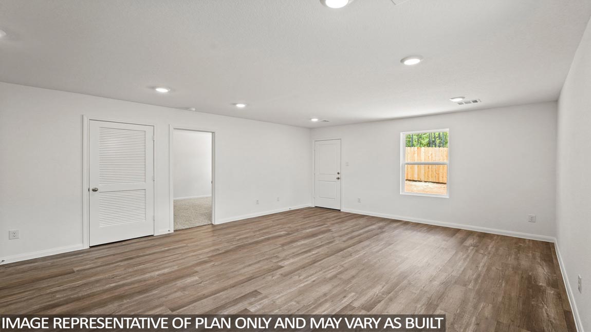 Open concept living, dining, and kitchen area