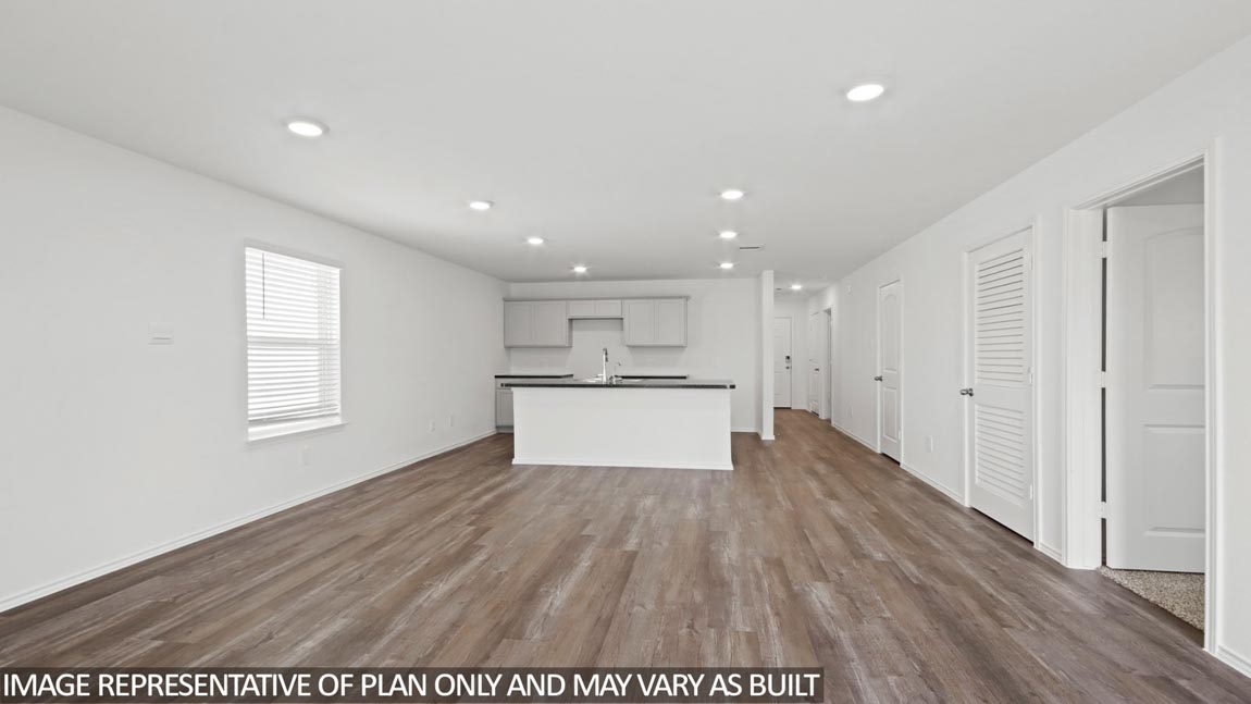 Open concept living, dining, and kitchen area