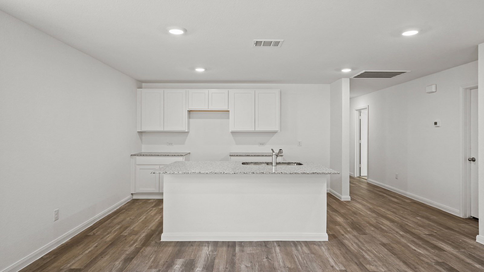 Open concept living, dining, and kitchen area