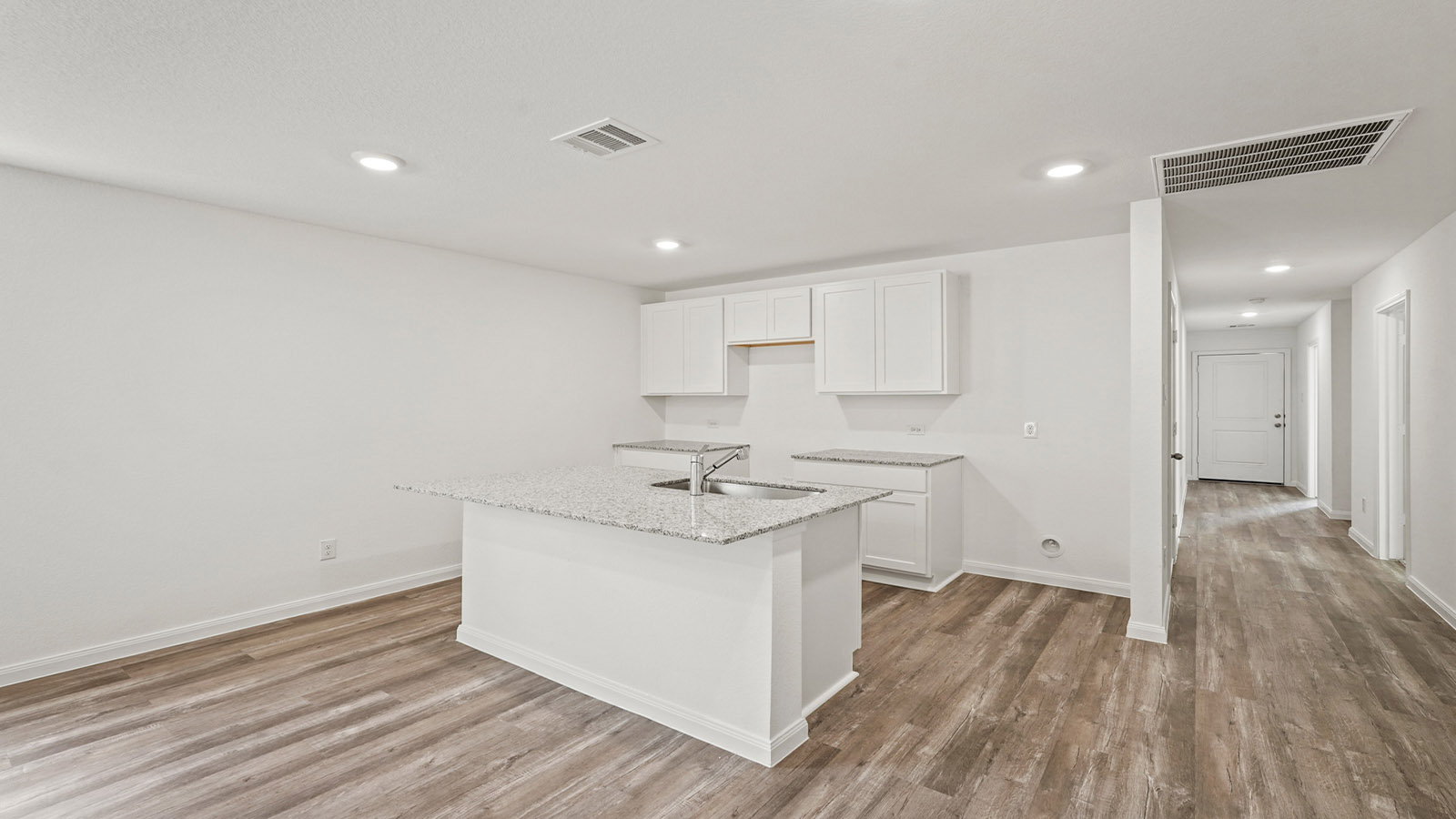 Open concept living, dining, and kitchen area