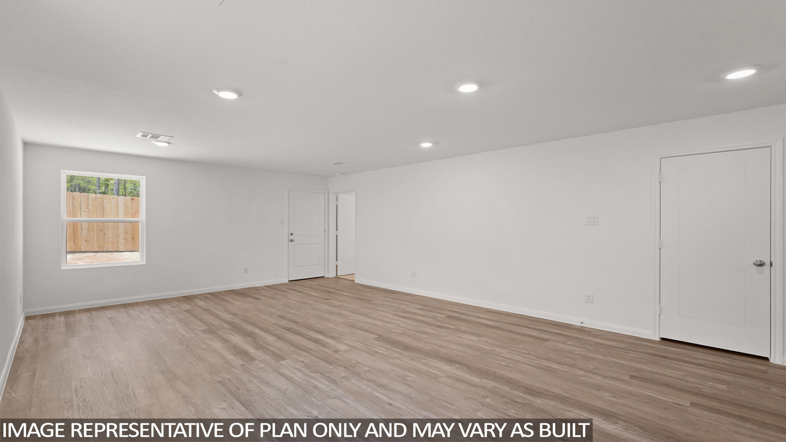 Open concept living, dining, and kitchen area