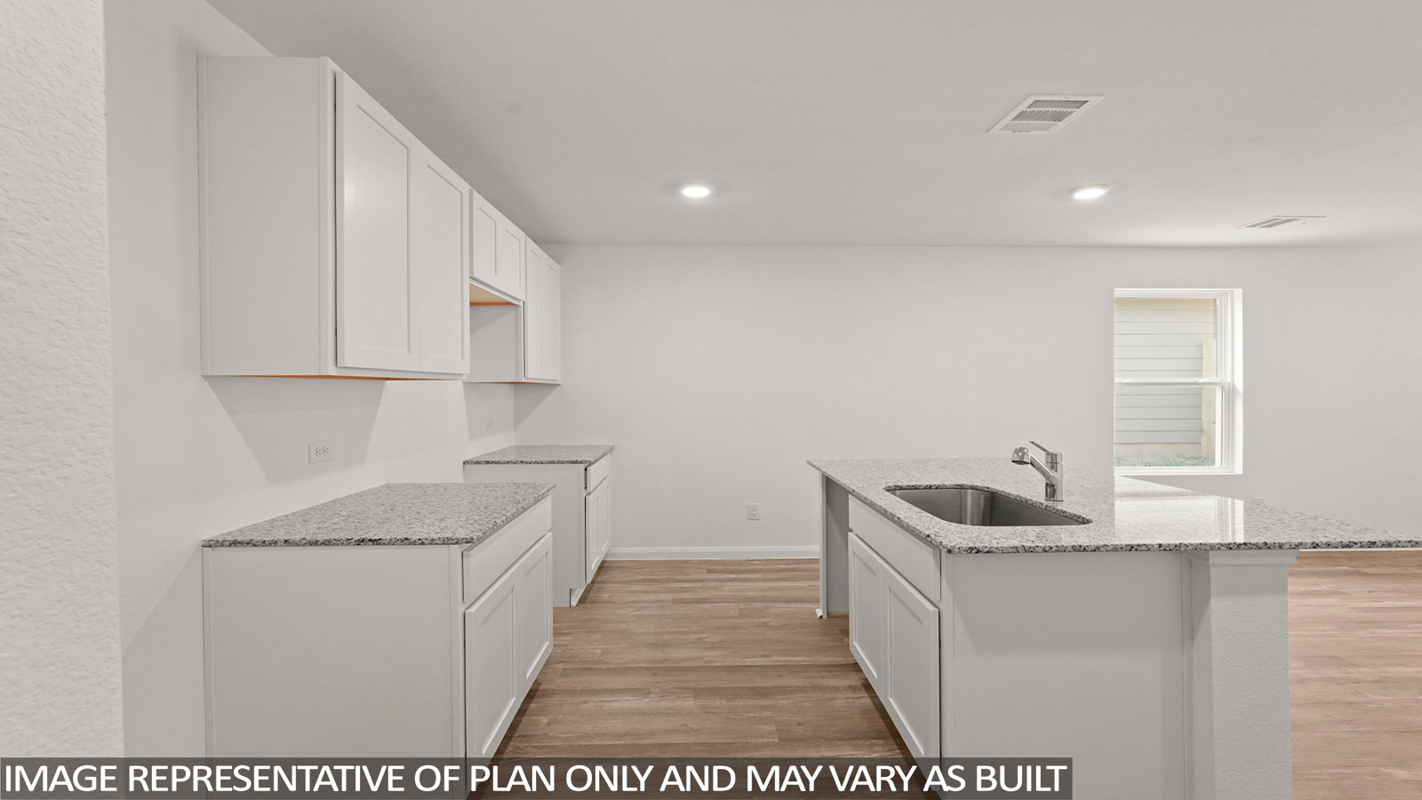 Open concept living, dining, and kitchen area