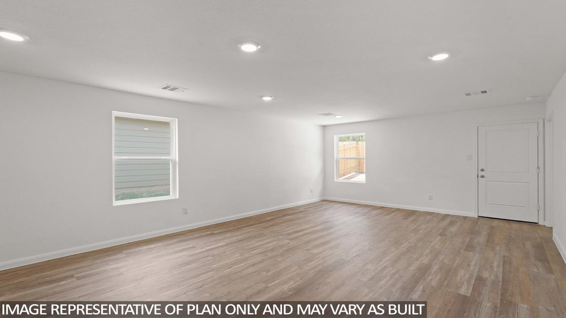 Open concept living, dining, and kitchen area