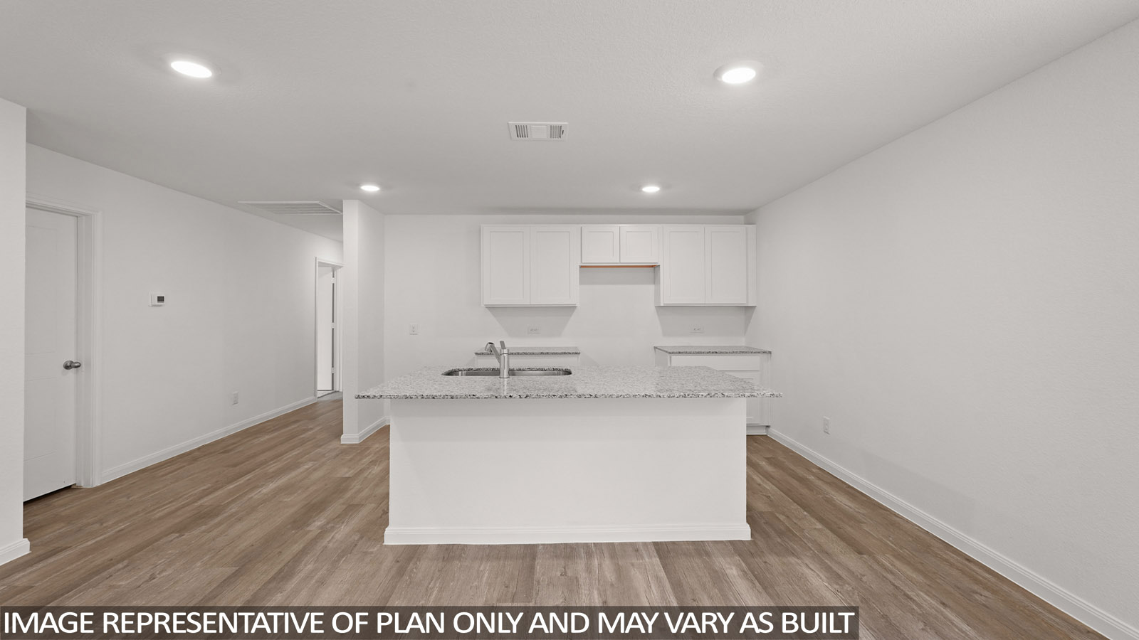 Open concept living, dining, and kitchen area