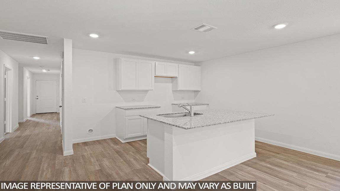 Open concept living, dining, and kitchen area