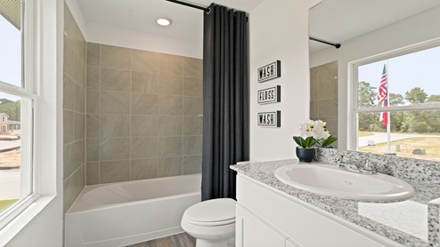 Secondary bathroom with single sink
