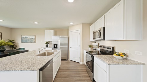 L- shaped kitchen with an island