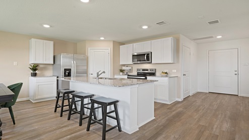 L- shaped kitchen with an island