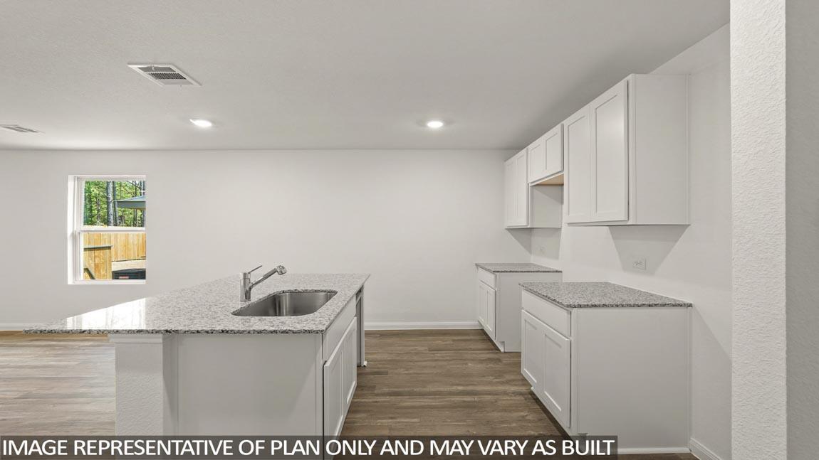 Open concept living, dining, and kitchen area