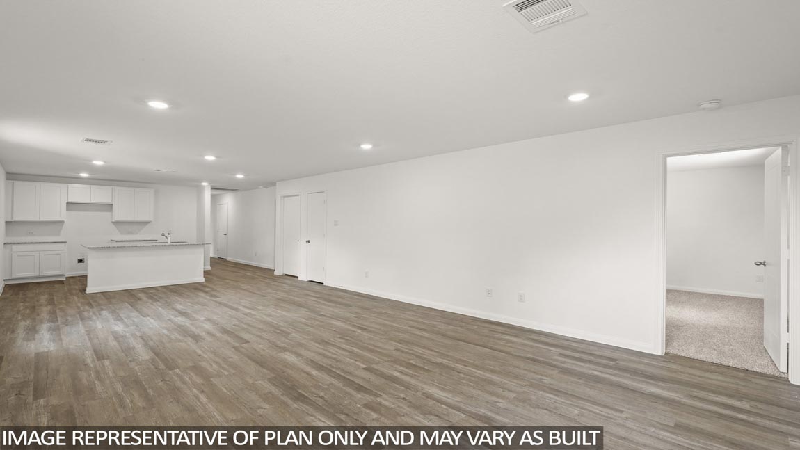 Open concept living, dining, and kitchen area