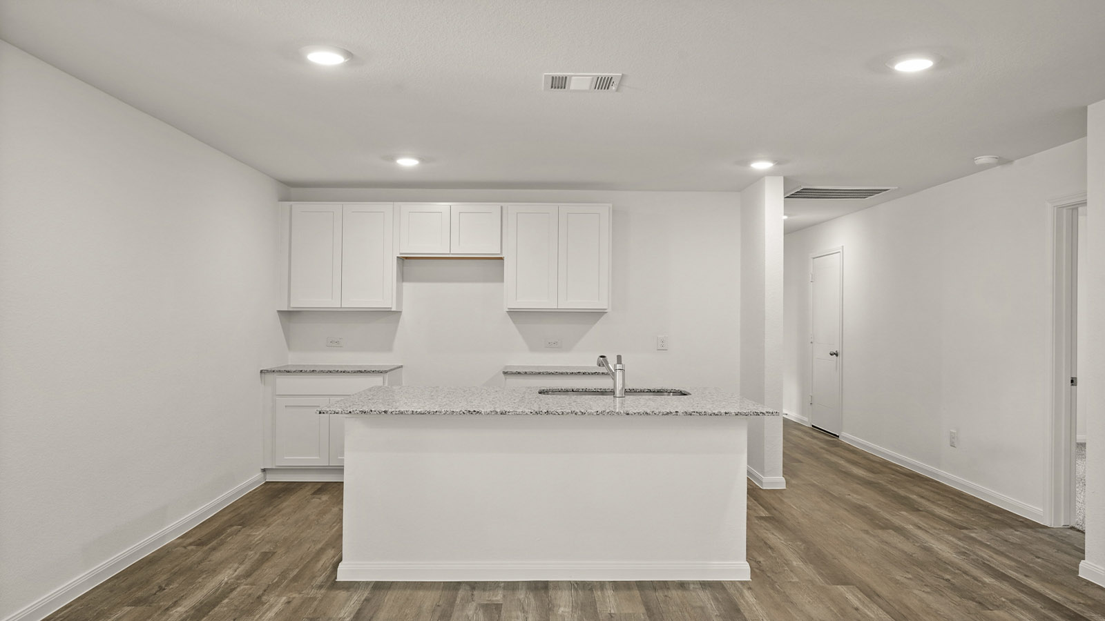 Open concept living, dining, and kitchen area