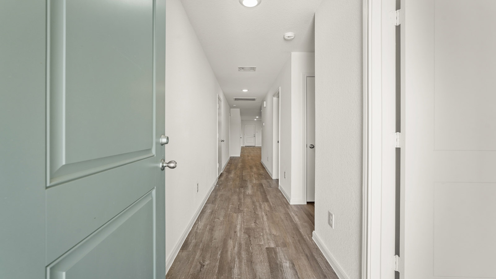 Entry hallway with vinyl flooring
