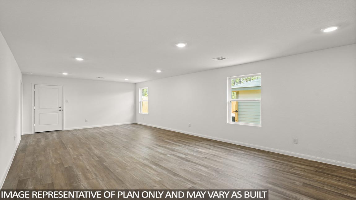 Open concept living, dining, and kitchen area