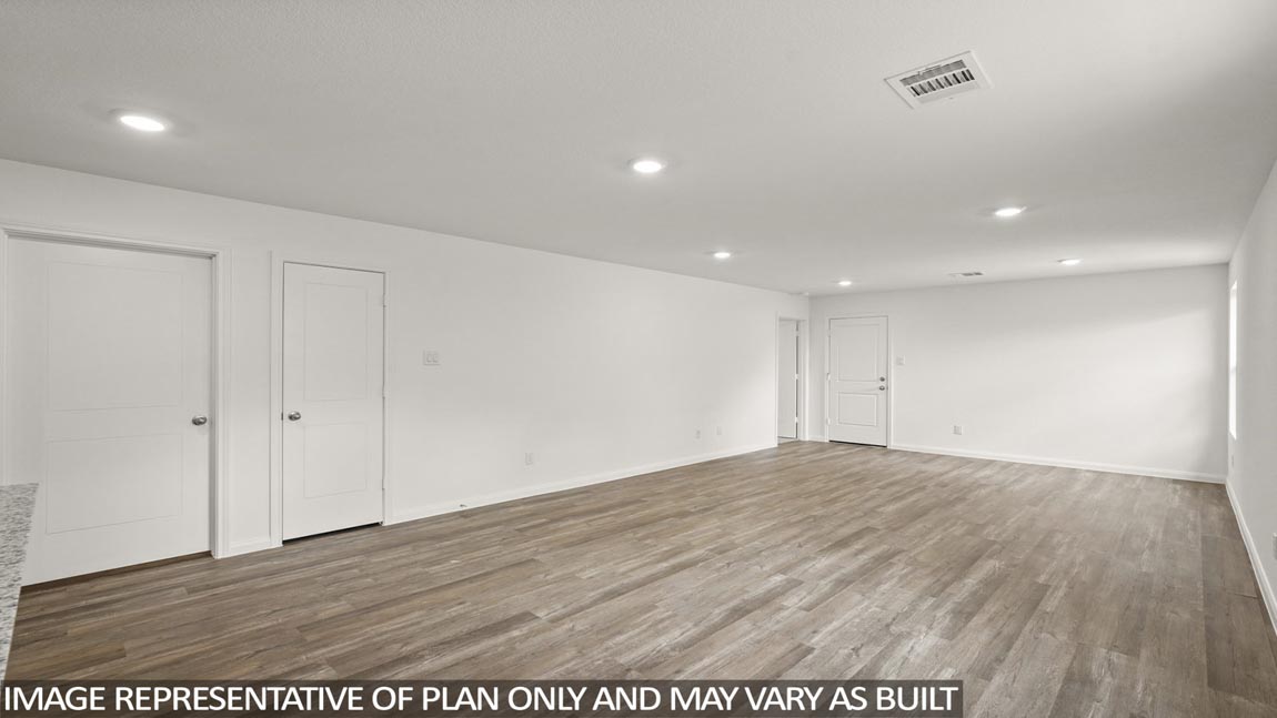 Open concept living, dining, and kitchen area