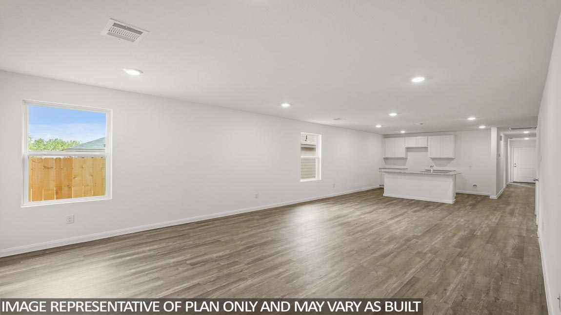 Open concept living, dining, and kitchen area