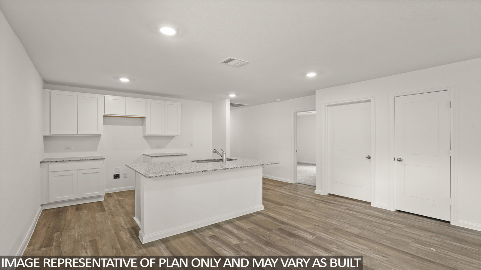 Open concept living, dining, and kitchen area