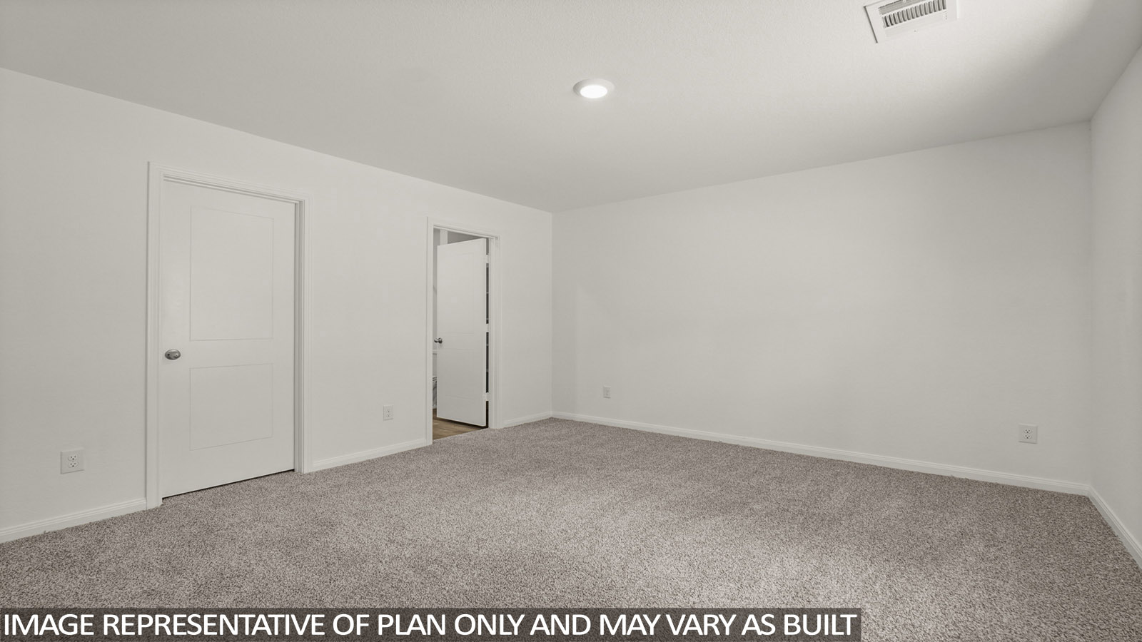 Primary bedroom with bright windows