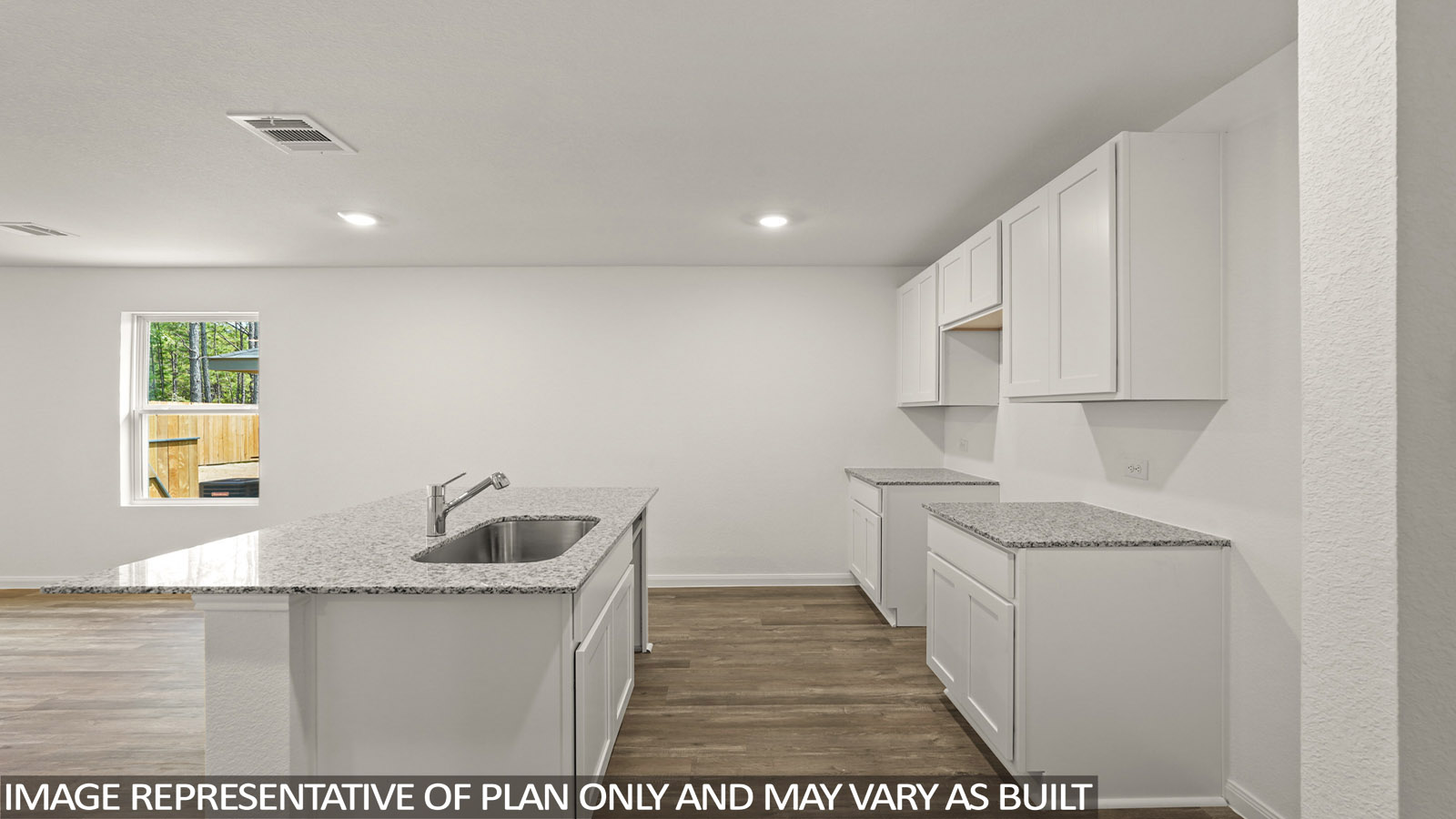 Open concept living, dining, and kitchen area