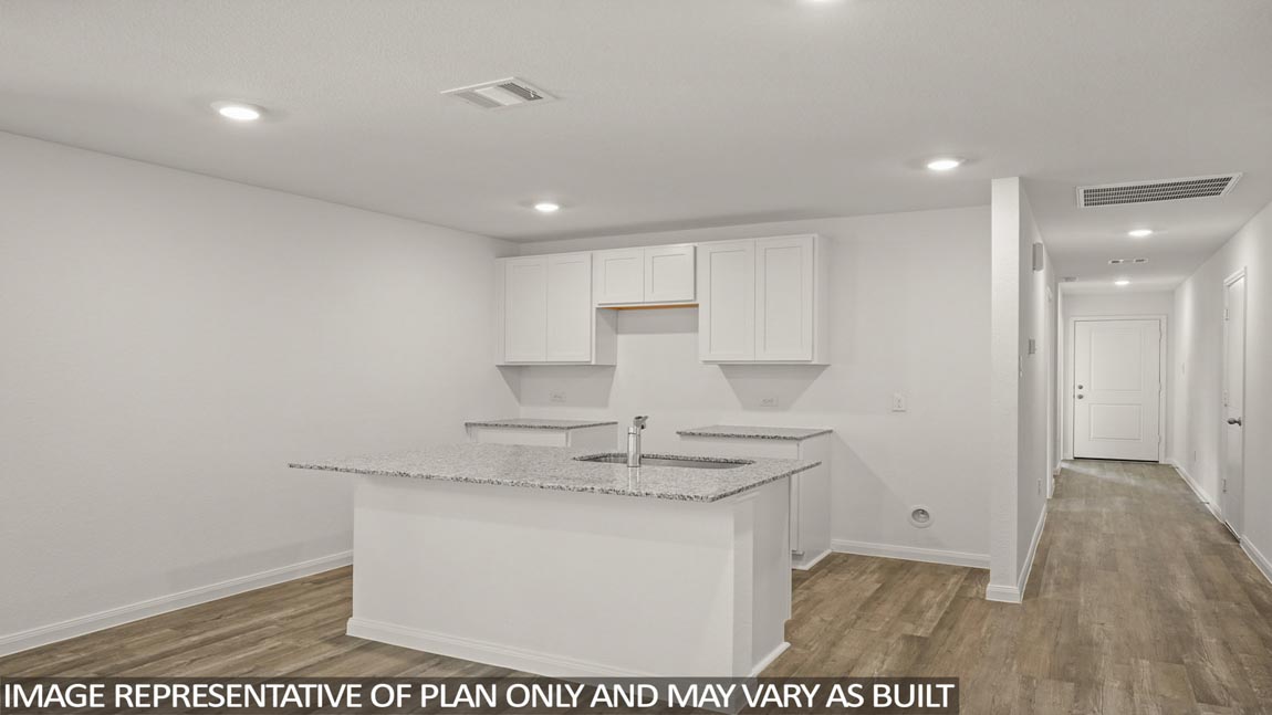 Open concept living, dining, and kitchen area