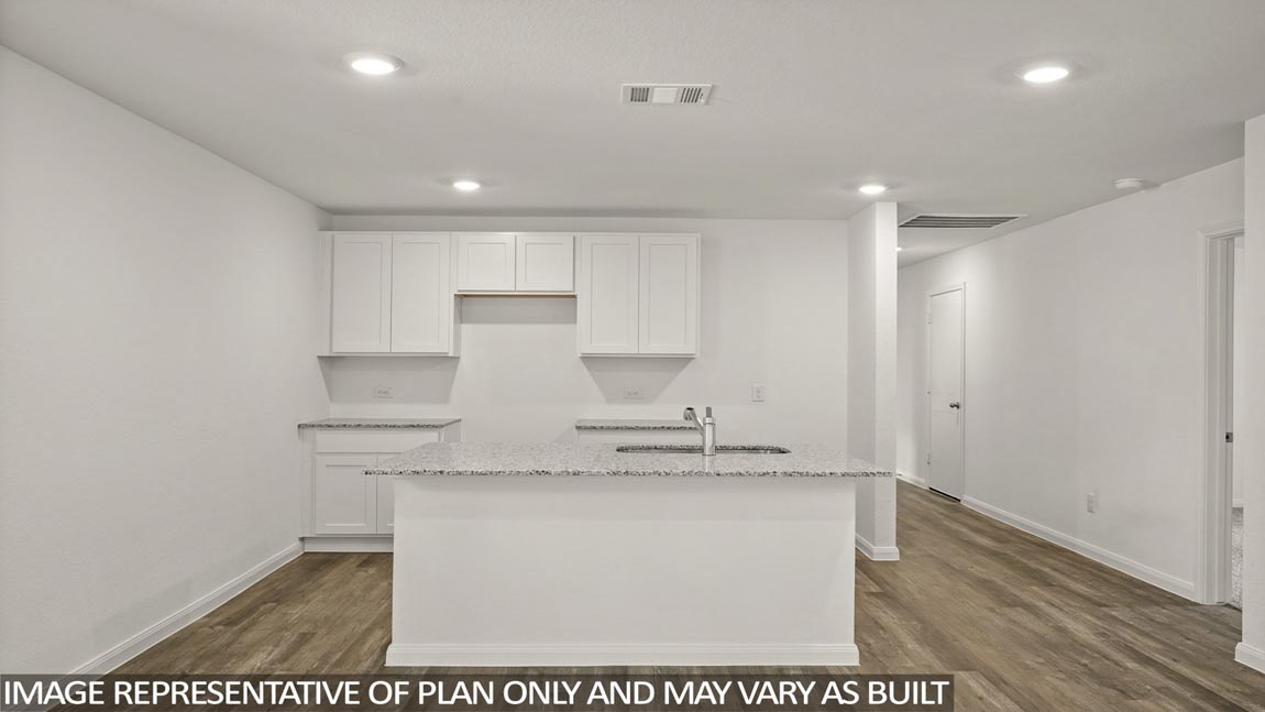 Open concept living, dining, and kitchen area