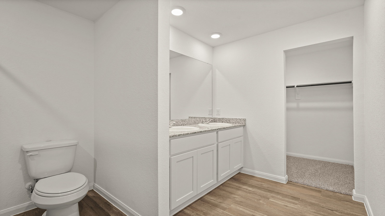 Primary bathroom with shower and linen storage