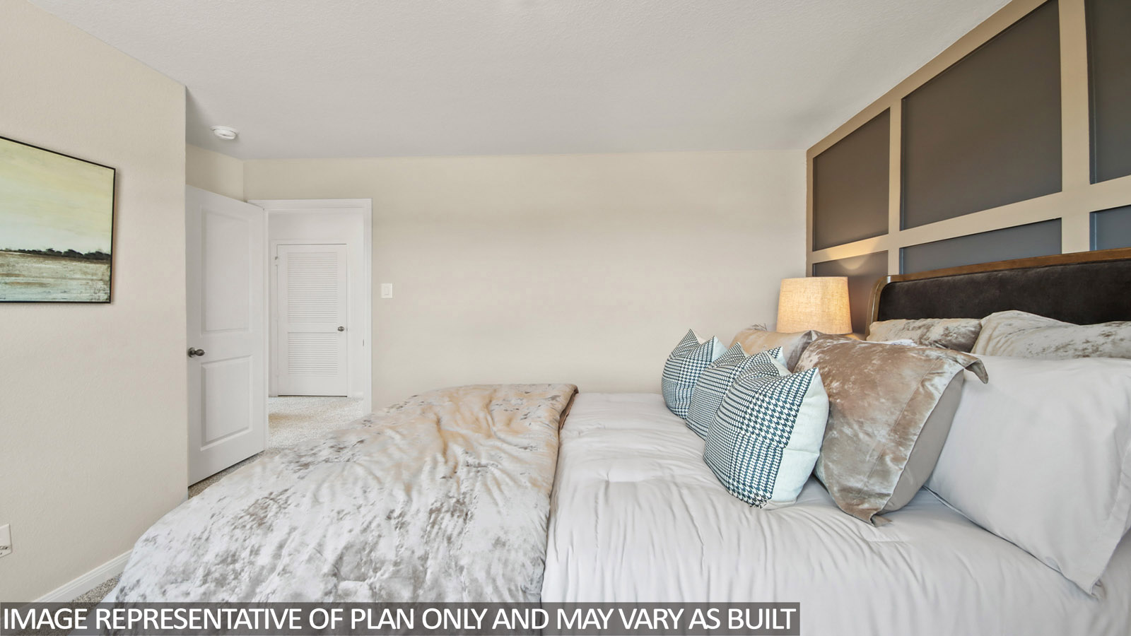 Primary bedroom with carpet flooring